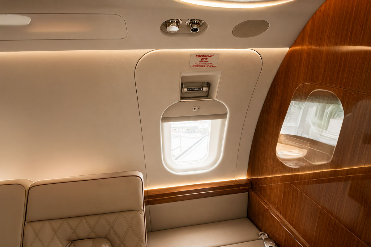 Inside plane cabin of a emergency evacutation training simulator showing the emergency exit 